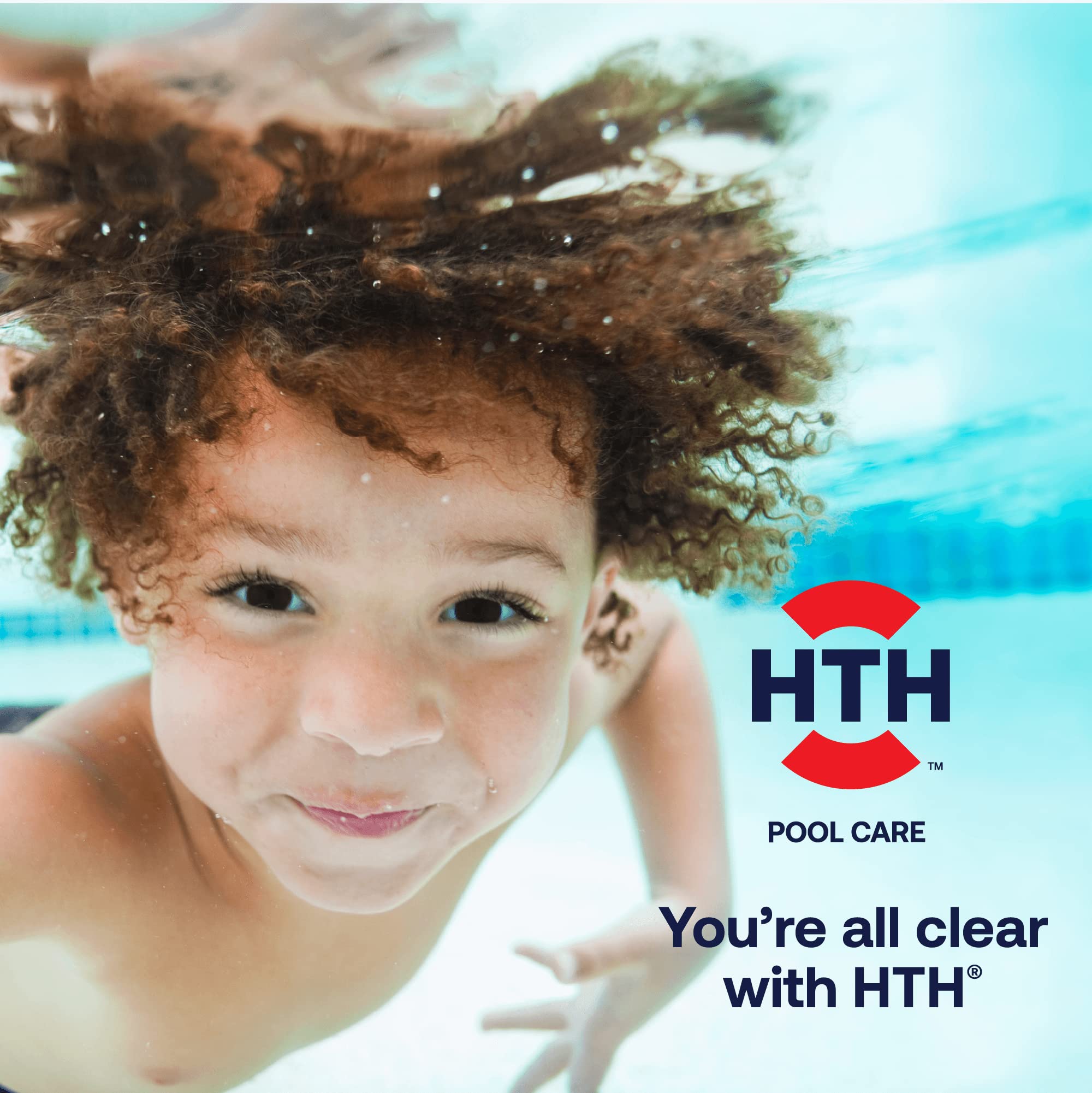 HTH Pool Care brand lifestyle photo of a child swimming underwater with the line You're all clear with HTH